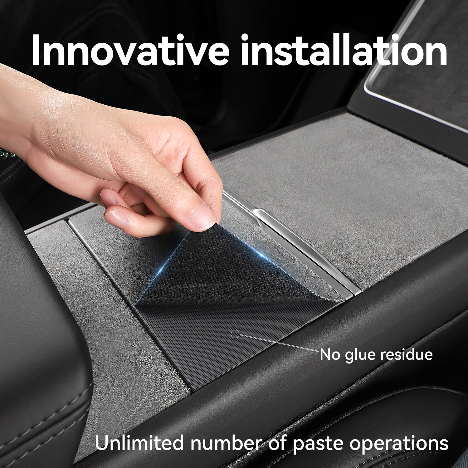 Demonstration of the innovative installation of a suede center console wrap, showing a hand peeling the corner to highlight the adhesive-free backing that leaves no glue residue and allows for unlimited reapplication.